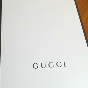 Thigh high Red Gucci boots.